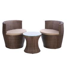 Faux Rattan Outdoor Patio Set This Brown Wicker Trio Features Two Chairs And A Glass Topped Round Table Tw Patio Dining Set Patio Furniture Sets Wicker Table