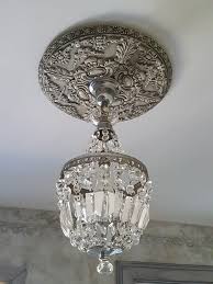 I Made This Ceiling Rose From A Charger Plate Iod Moldings And Chalk Paint Ceiling Rose Painted Ceiling Old Lamps