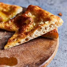 This fantastic pizza is topped with a homemade garlicky white sauce, spices, herbs, sargento® shredded parmesan cheese and more. Garlic Pizza Also The Crumbs Please