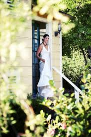 Strapless, form fitting, floral lace gown designed by kirstie kelly as part of the disney princess line. Kirstie Kelly Brings High Couture Wedding Dresses To The Mass Market And To The Beach Easy Reader News