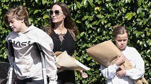 Shiloh Jolie Pitt Uses Crutches While Shopping With Angelina Jolie Hollywood Life Angelina jolie is frequently photographed out and about with her daughters. hollywood life