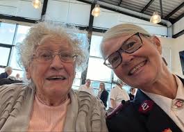 Captain Middleton of HMS RAMILLIES, greeting the 1st Sealord. Between the  two, R. M. Boy Bugler John Taylor can be seen,giving a side glance to the  meeting.