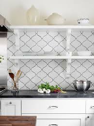 The hypnotizing black and white pattern makes you want to say here forever! Arabesque Backsplash Tile Dark Grout Black Countertop Backsplash Com
