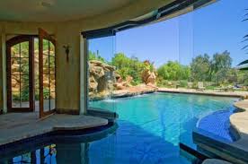 Amazing Pools That Are Both Indoor And Outdoor Indoor Outdoor Pool Luxury Swimming Pools Indoor Swimming Pool Design