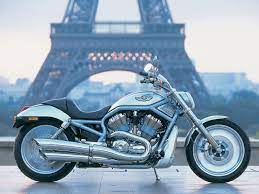 Check This Astonishing Harley Davidson Near The World Famous Eiffel Tower Harley Davidson Harley Davidson Wallpaper Harley Davidson Motorcycles