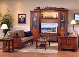 The entertainment center offers an organized space for your tv and accessories. Living Room Rivals Wall Units Vs Tv Stands Timber To Table