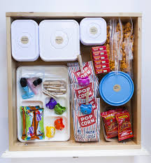 I keep ours in a pet food storage container i found at target. Snack Drawer Solved