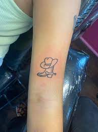 Cowboy boot and cowboy hat tattoo | Tattoos for daughters, Cute tattoos for  women, Tattoos for women