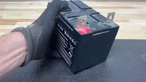 If your lawn mower battery won't hold a charge, connect it to the charger. How To Replace A Lawn Mower Battery Ariens Youtube