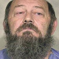 Son breaks down in testifying against father in murder case hearing