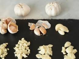 A clove of garlic is one segment of a head of garlic. Food Network Shows How To Crush Slice And Mince Garlic Food Network