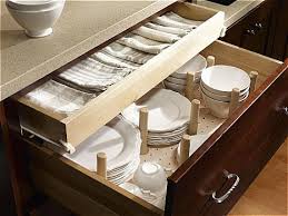 If you keep your dishes in a deep kitchen drawer, insert a dish drawer peg organizer! 11 Kitchen Organization Inserts Alliance Woodworking