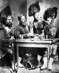 Piper David Muir, George Glen, Donald McKenzie and Colour Sergeant William  Gardner, 42nd Royal Highlanders, Posed Grouped Round a Table with Drinks at  Aldershot, UK, c.1856