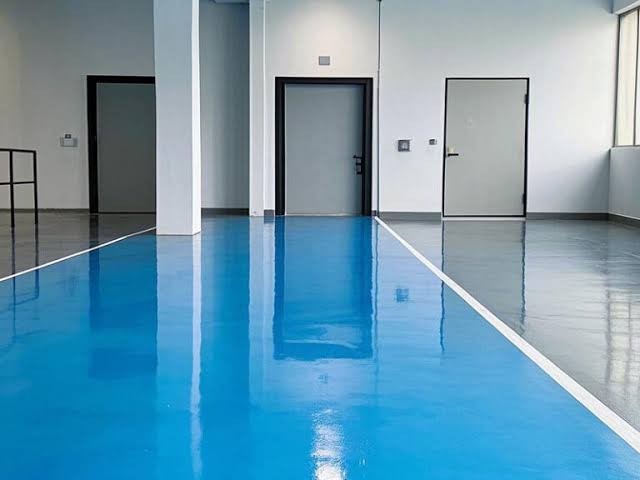 High-performance industrial MMA and acrylic coating floor system applied on concrete floor, offering rapid curing and chemical resistance.
