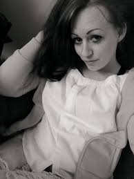 Una Donna Forte E Giovane, Occhi Sognanti, Fotografia Stock