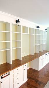 As a bonus, you can easily clean up your workspace and leave your work behind by just closing the closet door. Remodelaholic Build A Wall To Wall Built In Desk And Bookcase