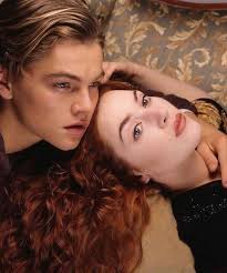 Tim Curry and Catherine Zeta Jones pose with a crew member behind the  scenes of the 1996 TV Movie Titanic.