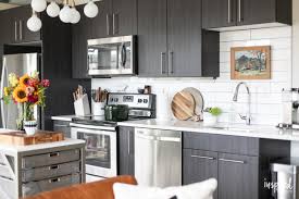Use the shelves to display and store dishes. Drab To Fab Apartment Kitchen Decor