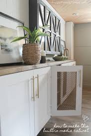 We also finalllyyyyy finished building our dining room table that would be perfect to share for this theme. Diy Media Cabinet Built In That Looks Great And Hides Everything Frugal Family Times