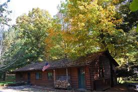 Located on the clarion river, near cook forest state park, our 3 bedroom cabin with wood burning fireplace, gas heat and front porch will accommodate 6 . Cabin 15 Cook Forest Cabins