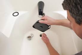 How To Use A Drain Snake To Quickly Clear Shower Clogs Shower Drain Bathtub Drain Bathroom Sink Drain