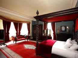 Breaking up the two tones allows for each to shine on their own in the space. 10 Red Bedroom Ideas And Designs