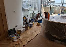 curved parquet gives kitchen floor the