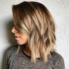 Instead of puffing out at the first sign of humidity, this style will only grow in a workable volume rather than in impossible frizz. Shaggy Layered Haircuts For Thick Hair Novocom Top