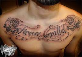 Roses And Writing On Chest Writing Tattoos Chest Tattoos For Women Cool Chest Tattoos