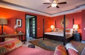 ديكورات غرف نوم ديكور غرفة نوم استوائية بجدران حمراء وارضية رخام Home Tropical Interior Interior Architecture Design