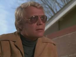 The opening scene of Salem's Lot describes Ben Mears as wearing sunglasses.  We are not treated to this in the actual movie. Maybe sunglasses