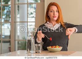 Nestle your fruit medley into one of these vessels. Redhead Woman Eating Fruit Bowl Kiwi And Strawberry At Home With Angry Face Negative Sign Showing Dislike With Thumbs Down Canstock