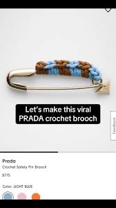 prada brooch pin