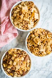 Pour the mixture over the crispy corn and rice cereal mixture. Homemade Chex Mix Recipe 3 Ways Original Spicy And Honey Nut