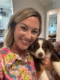 Marley the 6-month-old golden retriever giving high fives