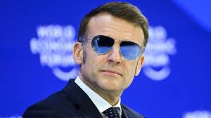Macron decries 'bullies' as he urges Trump to suspend tariffs