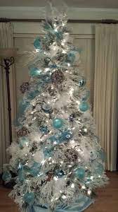 5 out of 5 stars. Snow White Flocked Christmas Tree Decorated With Aqua Blue Silver And Snow Vine Balls White Christmas Tree Decorations Blue Christmas Tree Aqua Christmas