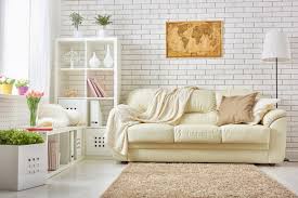 Small living room with feature wall to make a room look bigger by designer, drew f. What Colors Make A Room Look Bigger And Brighter House Trick