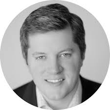 Travis Lusk Headshot b&w circle