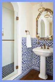 Plain white tiles are rarely. Mediterranean Bathroom Design Boasts Blue Moroccan Style Wall Tiles Surrounding A Pedestal Si Mediterranean Bathroom Mediterranean Decor Moroccan Tile Bathroom