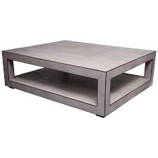 This coffee table features a rich black iron base and is topped with a stunning grey shagreen table top. Custom Genuine Light Gray Shagreen Cocktail Table For Sale At 1stdibs