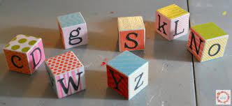 Involve your guests in making these simple alphabet wooden blocks for a baby's nursery. Diy Alphabet Blocks Tutorial Mabey She Made It