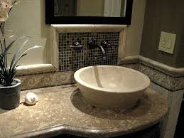classic travertine sink bowls rest on