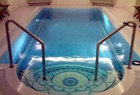 Indoor Swimming Pools And Pool Enclosures Add Luxury To House Designs