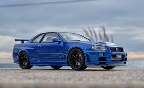 Therefore nismo purchased 20 models of the r34 and then upgraded its 2.6l i6 engine to a 2.8l that. Otto Mobile Nissan Skyline Gt R R34 Nismo Z Tune Spec Metallic Blue 1 18 A Photo On Flickriver