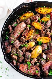 How do you cook a steak in a cast iron skillet? Skillet Garlic Butter Steak And Potatoes Aberdeen S Kitchen