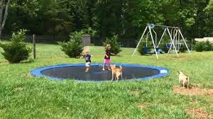 You will need someone to help place the level between the stakes. Diy In Ground Trampoline Youtube