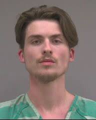 Naples man arrested after allegedly shooting into woods along I-75 may also  be connected with hit-and-run motorcycle crash that left one in critical  condition