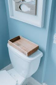 Well you're in luck, because here they come. How To Style A Back Of Toilet Tray Decor Hint