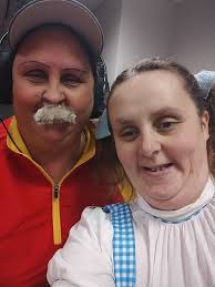 Hi my name is Cynthia and I am the biggest Chiefs there ever was!! Here is  a pic of my mom dressed as coach andy Reid